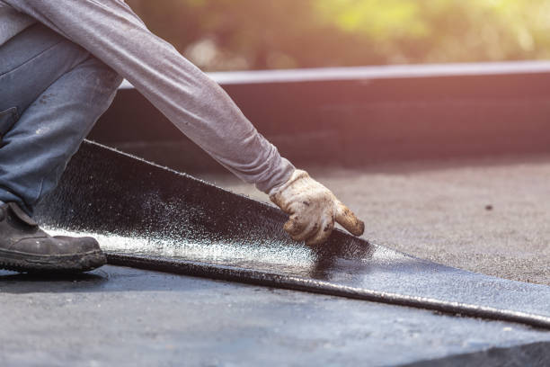 Professional Waterproofing technician working in Midland, MI